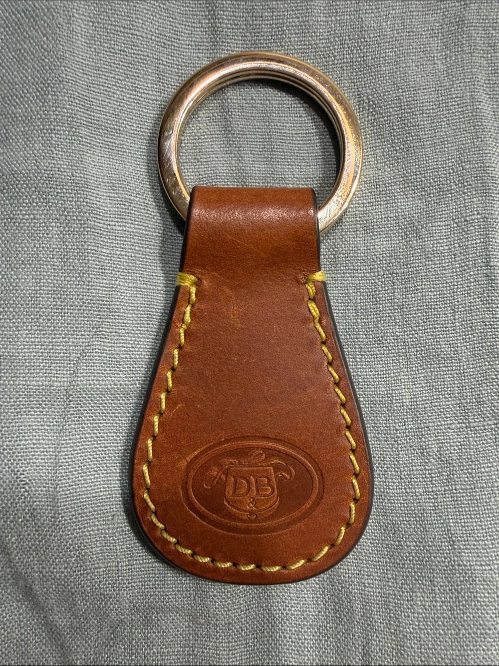 Dooney & Bourke Brown Leather Key Fob Ring with Yellow Stitching